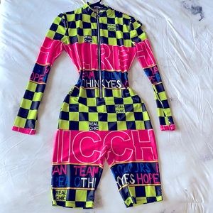 Colorful shorts body suit. Real chic and fun.